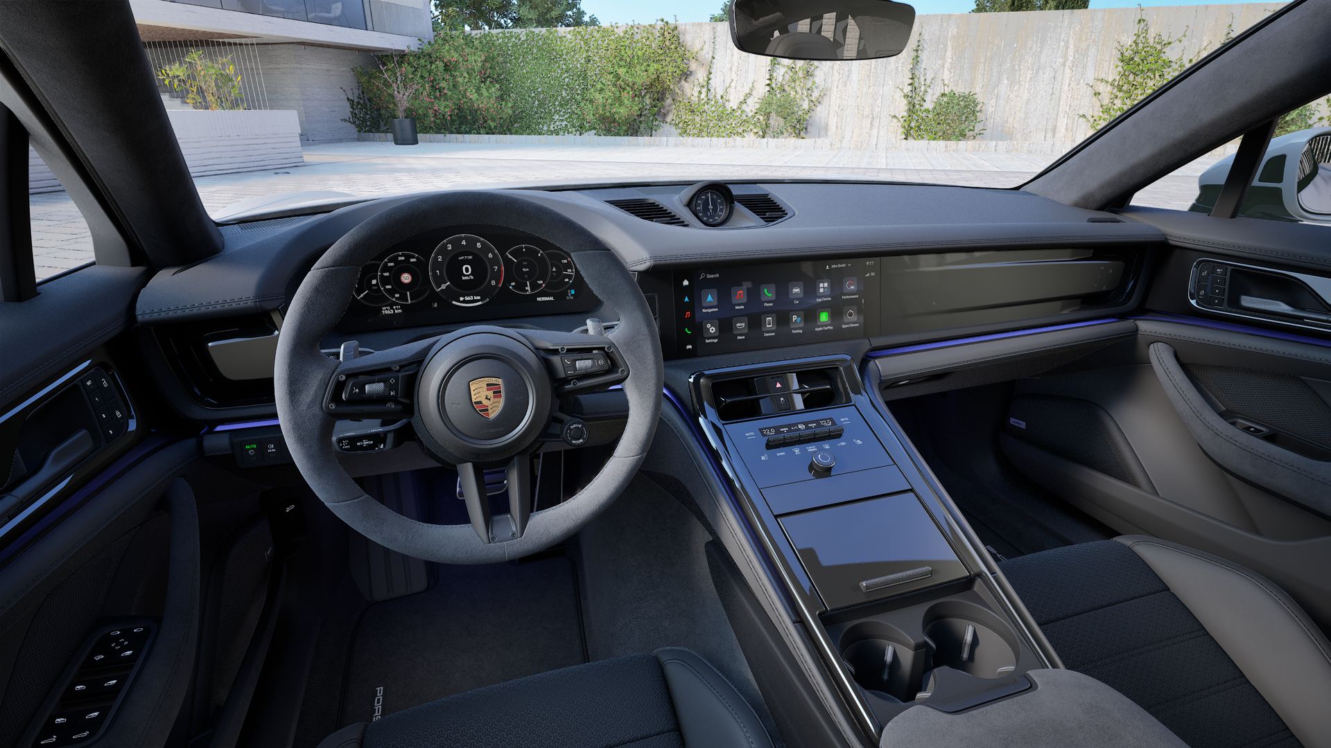 Interior view showing the steering wheel and dashboard of Panamera GTS