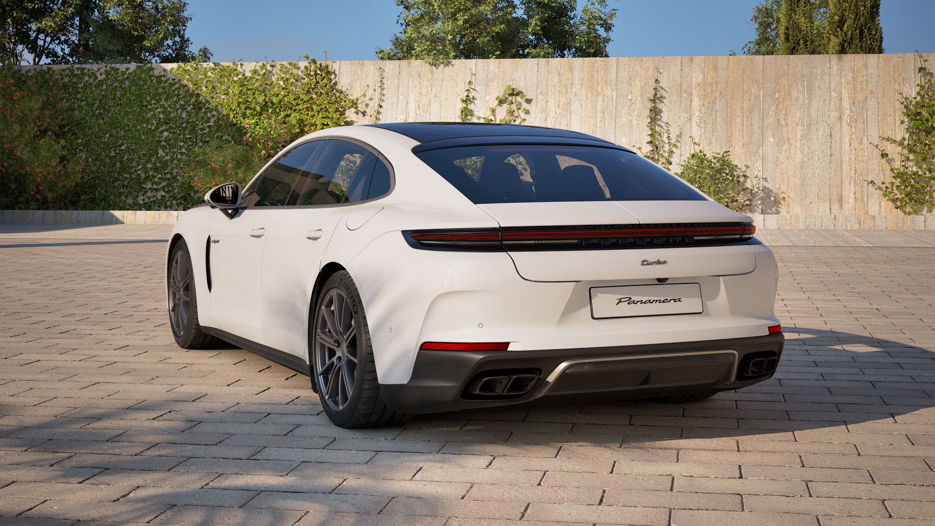 Exterior view of Panamera Turbo E-Hybrid showing the back and left side of the car