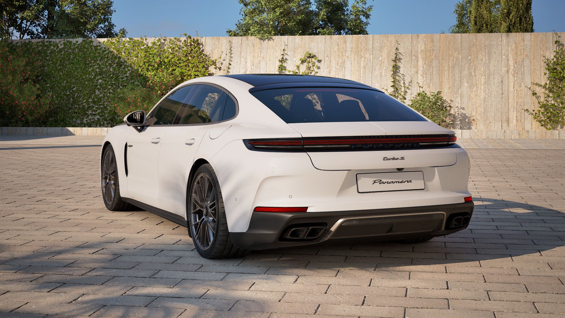 Exterior view of Panamera Turbo S E-Hybrid showing the back and left side of the car
