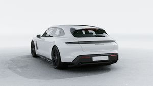 Außenansicht von Taycan GTS Sport Turismo mit der Rückseite und der linken Seite des Fahrzeugs