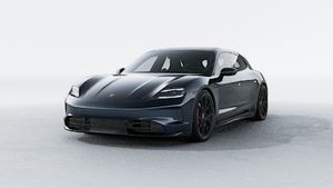Außenansicht von Taycan GTS Sport Turismo mit der Vorderseite und der linken Seite des Fahrzeugs
