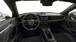 Interior view showing the steering wheel and dashboard of 911 Turbo S Cabriolet