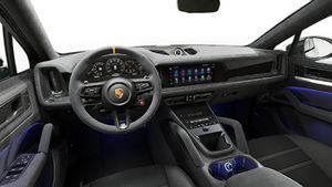 Interior view showing the steering wheel and dashboard of Cayenne Turbo GT