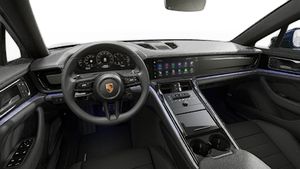 Interior view showing the steering wheel and dashboard of Panamera 4 Executive
