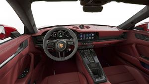 Vista interior, mostrando o volante e o painel de instrumentos de 911 Carrera GTS