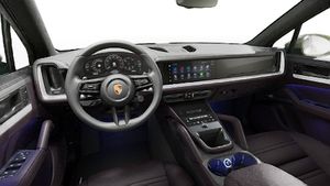 Vista interior, mostrando o volante e o painel de instrumentos de Cayenne S