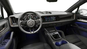Vista interior, mostrando o volante e o painel de instrumentos de Cayenne Turbo E-Hybrid