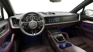 Vista interior, mostrando o volante e o painel de instrumentos de Cayenne Turbo E-Hybrid