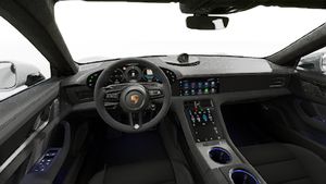 Vista interior, mostrando o volante e o painel de instrumentos de Taycan GTS
