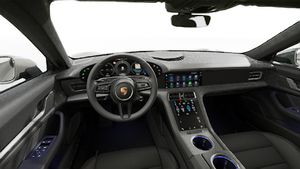 Vista interior, mostrando o volante e o painel de instrumentos de Taycan Sport Turismo