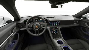 Vista interior, mostrando o volante e o painel de instrumentos de Taycan Sport Turismo
