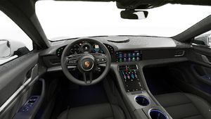 Vista interior, mostrando o volante e o painel de instrumentos de Taycan Sport Turismo