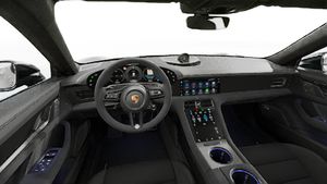 Vista interior, mostrando o volante e o painel de instrumentos de Taycan GTS Sport Turismo