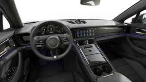 Vista interior, mostrando o volante e o painel de instrumentos de Panamera Turbo E-Hybrid