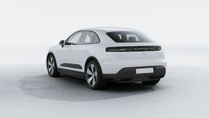 Exterior view of Macan 4 showing the back and left side of the car