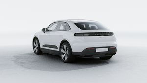 Exterior view of Macan 4 showing the back and left side of the car