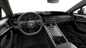 Interior view showing the steering wheel and dashboard of Panamera 4 E-Hybrid Executive