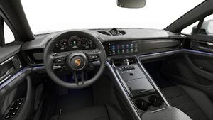 Interior view showing the steering wheel and dashboard of Panamera 4 E-Hybrid Executive