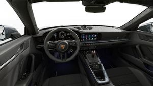 Interior view showing the steering wheel and dashboard of 911 Carrera T Cabriolet