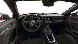 Interior view showing the steering wheel and dashboard of 911 Carrera T Cabriolet