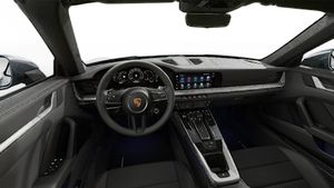 Interior view showing the steering wheel and dashboard of 911 Carrera Cabriolet