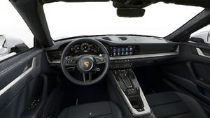 Interior view showing the steering wheel and dashboard of 911 Carrera Cabriolet