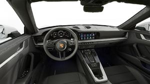 Interior view showing the steering wheel and dashboard of 911 Carrera Cabriolet