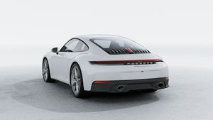 Exterior view of 911 Carrera 4S showing the back and left side of the car