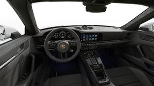 Interior view showing the steering wheel and dashboard of 911 Targa 4 GTS