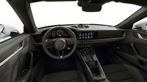 Interior view showing the steering wheel and dashboard of 911 Turbo S Cabriolet