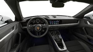 Interior view showing the steering wheel and dashboard of 911 Carrera 4S Cabriolet