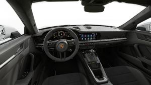 Interior view showing the steering wheel and dashboard of 911 GT3
