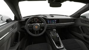 Interior view showing the steering wheel and dashboard of 911 GT3