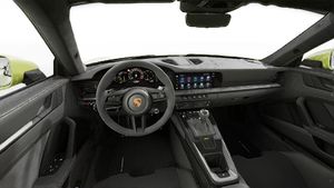 Interior view showing the steering wheel and dashboard of 911 GT3