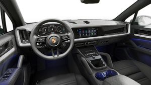 Interior view showing the steering wheel and dashboard of Cayenne