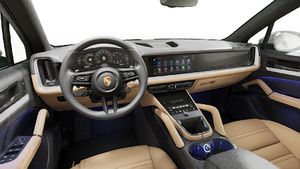 Interior view showing the steering wheel and dashboard of Cayenne