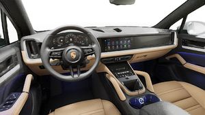 Interior view showing the steering wheel and dashboard of Cayenne