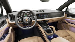 Interior view showing the steering wheel and dashboard of Cayenne E-Hybrid