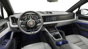 Interior view showing the steering wheel and dashboard of Cayenne E-Hybrid