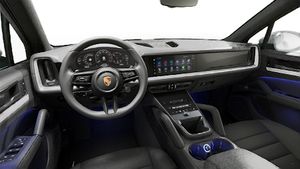 Interior view showing the steering wheel and dashboard of Cayenne S