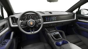Interior view showing the steering wheel and dashboard of Cayenne S