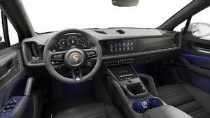 Interior view showing the steering wheel and dashboard of Cayenne GTS