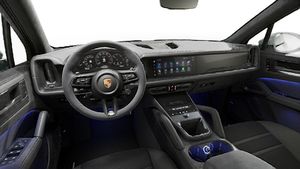 Interior view showing the steering wheel and dashboard of Cayenne GTS