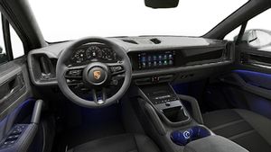 Interior view showing the steering wheel and dashboard of Cayenne GTS