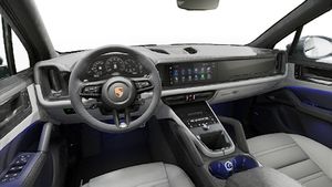 Interior view showing the steering wheel and dashboard of Cayenne GTS
