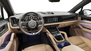 Interior view showing the steering wheel and dashboard of Cayenne Turbo E-Hybrid