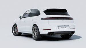 Exterior view of Cayenne Turbo E-Hybrid showing the back and left side of the car