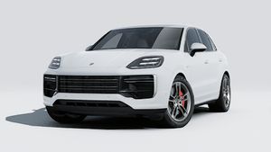 Exterior view of Cayenne Turbo E-Hybrid showing the front and left side of the car