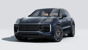 Exterior view of Cayenne Turbo E-Hybrid showing the front and left side of the car