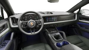 Interior view showing the steering wheel and dashboard of Cayenne Coupe
